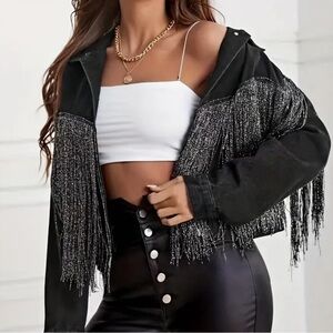 Black denim fringe jacket. Long sleeve woman’s size large.